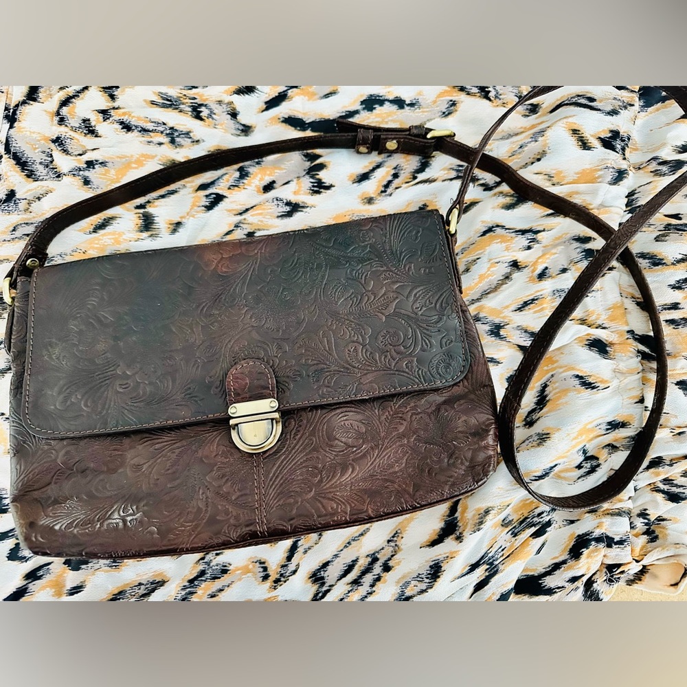 Dark brown tooled leather crossbody bag
